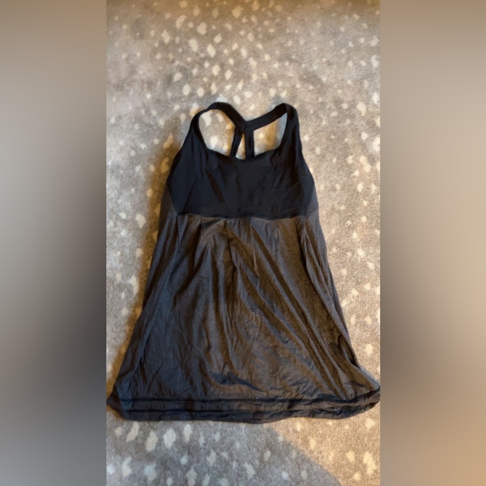 This is a black Lululemon tank top! It has a built in bra!